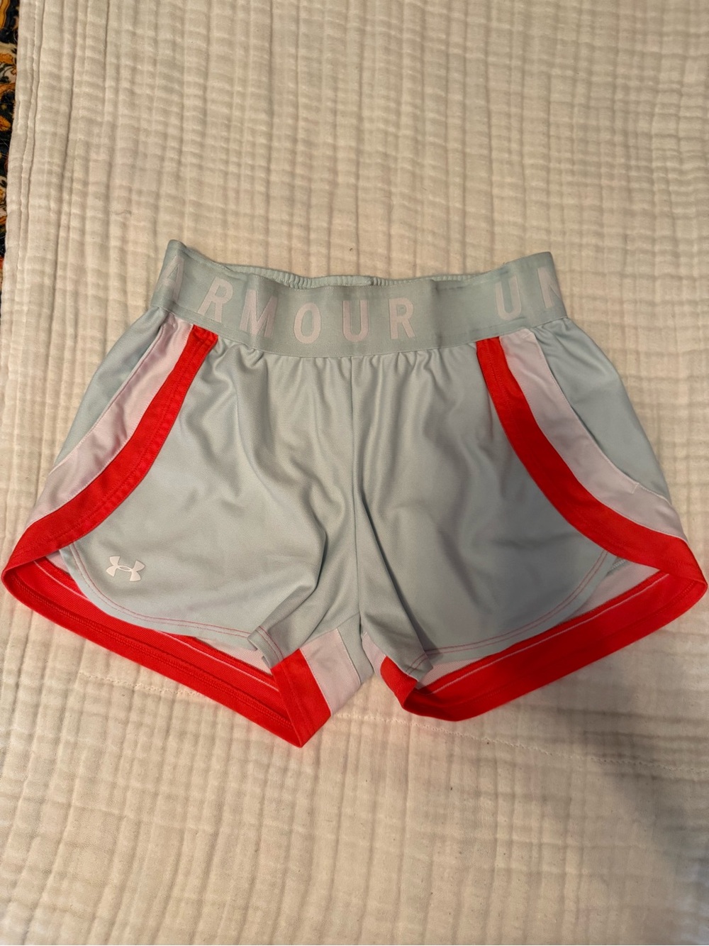 Under Armour Women's Light Blue Athletic Shorts with Coral Accents